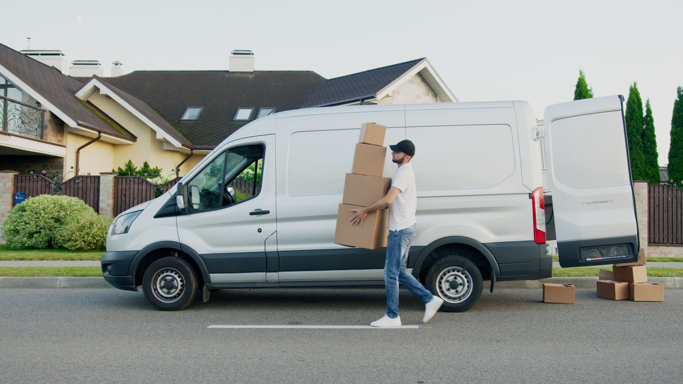 A removals van on a quiet residential street